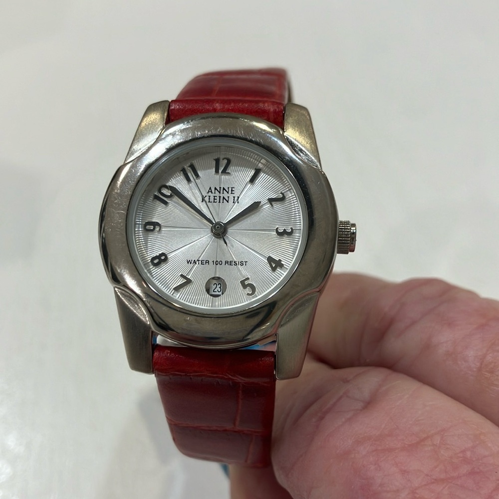ANNE KLEIN II brand new in box watch with a red leather band.